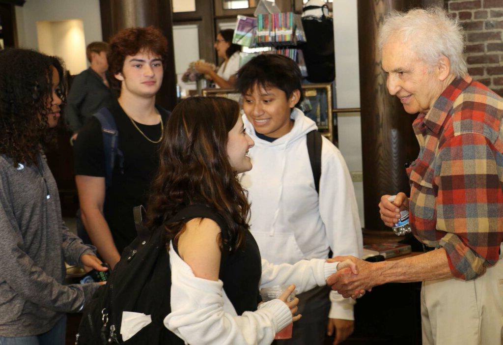 Joseph McElroy ’47 with students